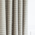 a sage green and cream horizontal stripe drapery fabric