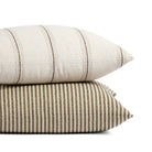 Tonic Living Crosby Stripe Truffle and Gibson Stripe Birch throw pillows stacked in coordinating brown and beige stripes.