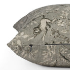 Tonic Living Cyprus smokey blue-grey toss pillow in linen-blend, showing side zipper detail and botanical animal pattern
