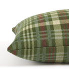 Side view of Tonic Living Dasher plaid lumbar pillow featuring a classic green and burgundy check pattern.