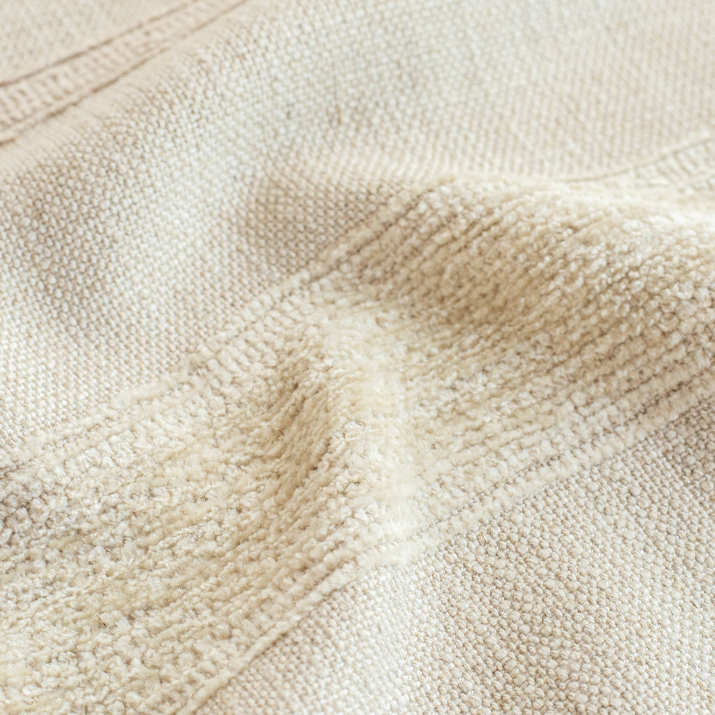 a cream and oatmeal beige chenille striped fabric