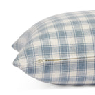 Side zipper detail of Tonic Living Emmett Plaid 20x20 pillow in blue and white plaid.