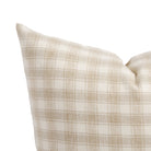 Close up of Tonic Living Emmett Plaid cushion showing its classic beige and white gingham pattern.