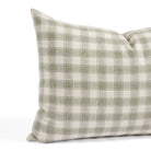 Close up of Tonic Living Emmett Plaid lumbar pillow showing its classic sage green gingham pattern.