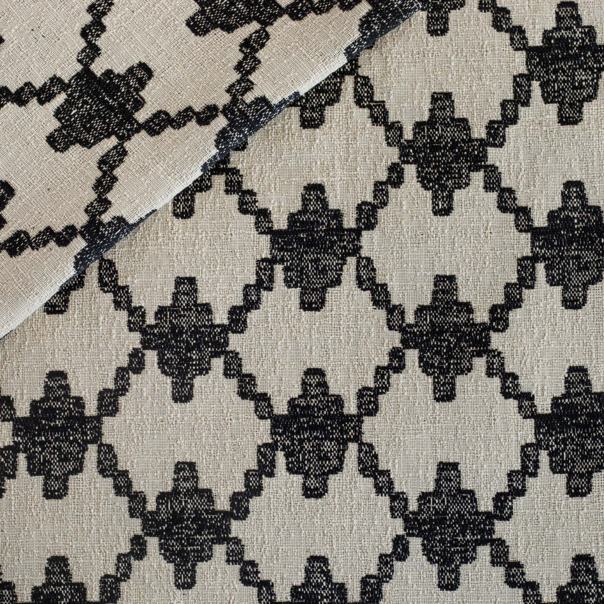 a black and natural abstract geometric patterned outdoor upholstery fabric