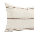 Close up of Tonic Living Gibson Stripe Birch lumbar cushion showing neutral beige and brown stripes with fine woven details.