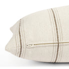 Side zipper detail of Tonic Living Gibson Stripe 16x42 extra large lumbar pillow in beige and brown stripes.