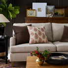 Living room with Grace Rosewood and Bedford Coffee brown throw pillows styled on a sofa – Tonic Living