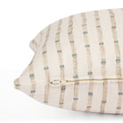 Side zipper detail of Tonic Living Hadley Stripe 14x20 decorative cushion featuring blue and warm brown stripes on off-white.