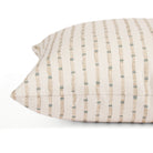 Side view of Tonic Living Hadley Stripe Mist decorative cushion highlighting its blue and brown organic striped pattern.