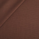 Tonic Living Hampton Fabric in Burgundy, an earthy burgundy high-performance upholstery fabric with the look of Belgian linen.