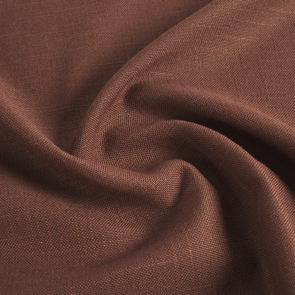 Tonic Living Hampton Burgundy performance upholstery fabric featuring a linen-inspired texture and deep burgundy colour with brown undertones.