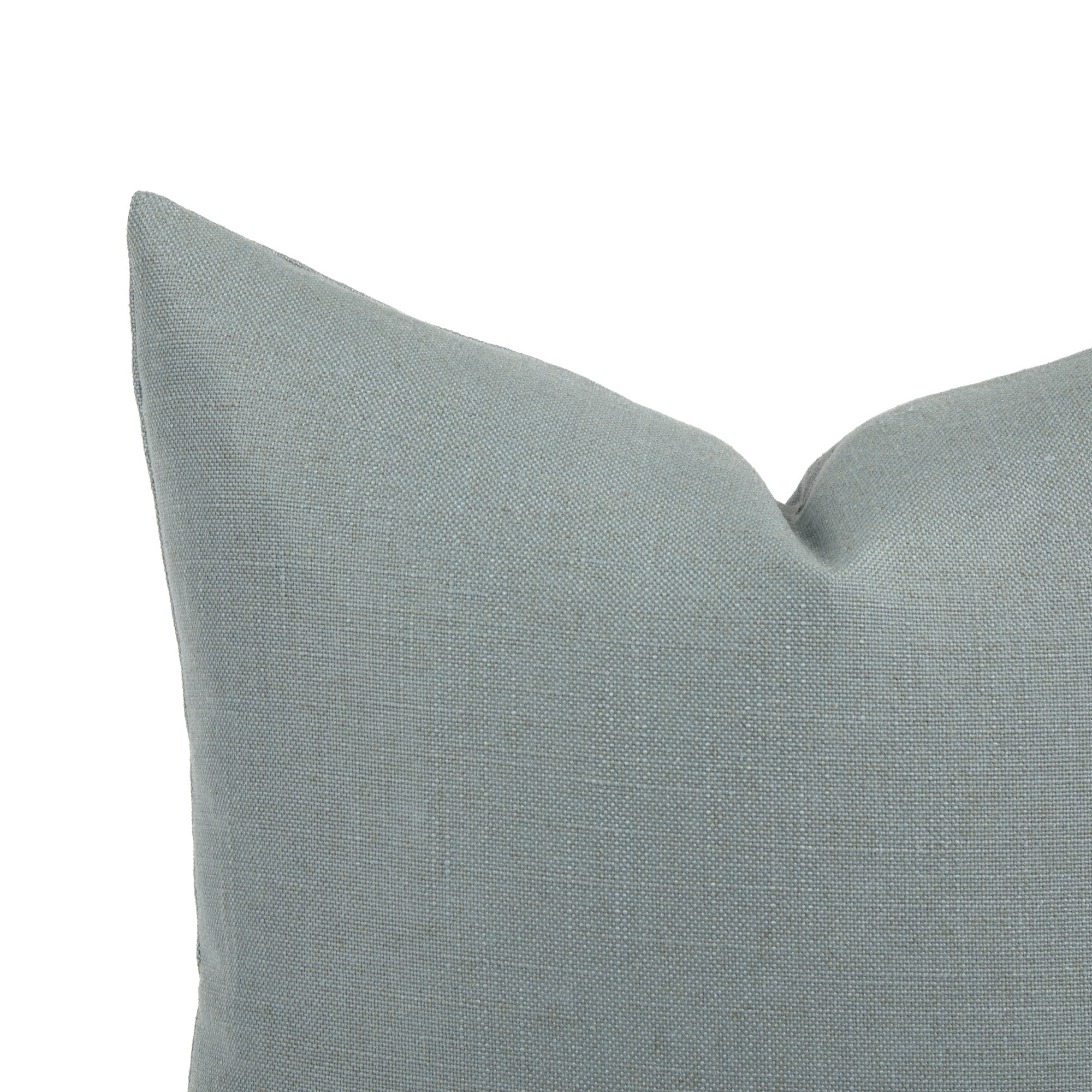 Close up of Tonic Living Hampton Chambray cushion showing soft blue woven texture with linen-inspired finish.