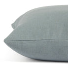 Side view of Tonic Living Hampton Chambray decorative pillow highlighting its chambray blue Belgian linen look.