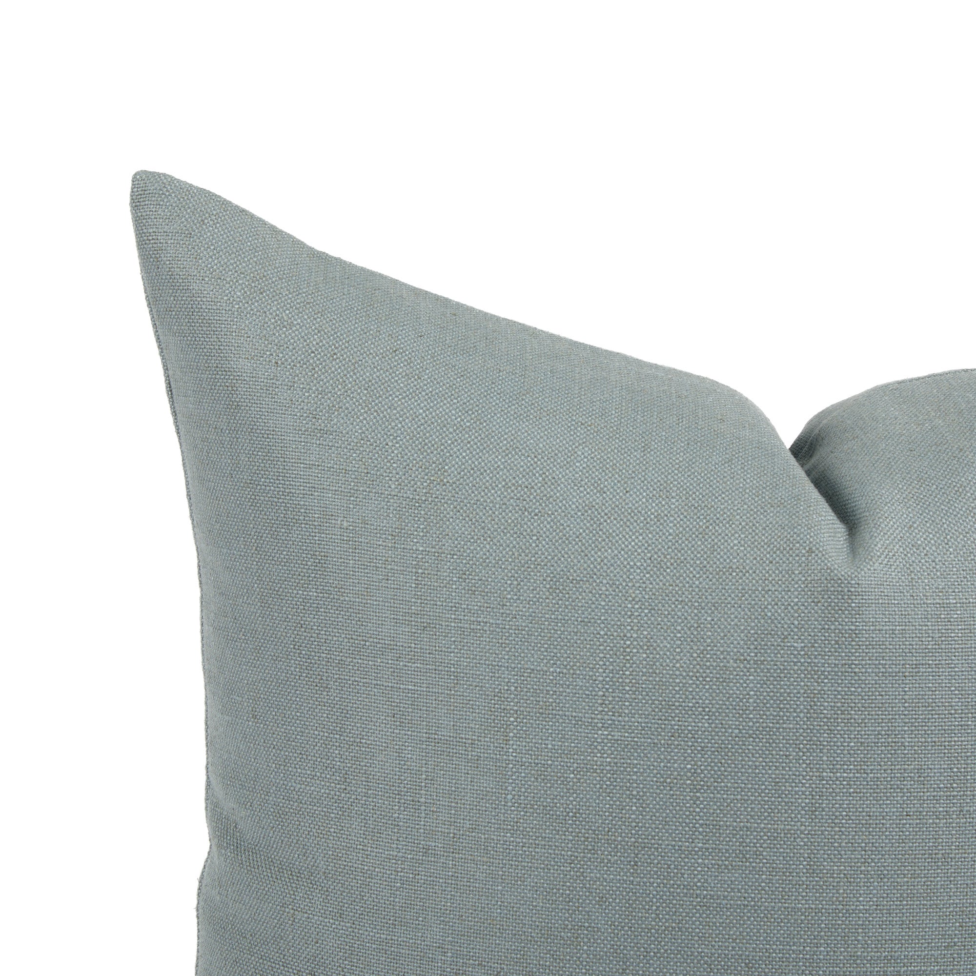 Close up of Tonic Living Hampton Chambray cushion showing soft blue woven texture with linen-inspired finish.