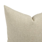 Close up of Tonic Living Hampton Oatmeal cushion showing soft beige woven texture with linen-inspired finish.
