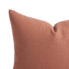 Close up of Tonic Living Hampton Rosewood pillow showing its earthy pink colour, terracotta tones, and linen-inspired woven texture.