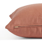 Side zipper detail of Tonic Living Hampton 22x22 pillow in earthy rose pink with a linen-inspired texture.