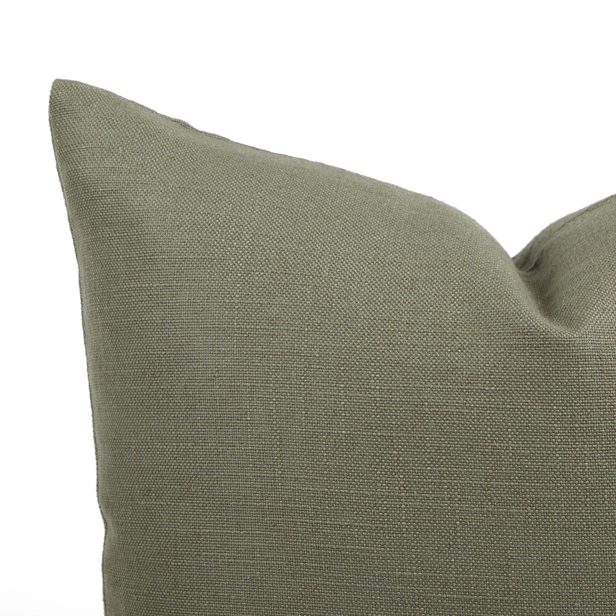 Close up of Tonic Living Hampton Sage cushion showing soft green woven texture with linen-inspired finish.
