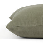 Side view of Tonic Living Hampton Sage decorative pillow highlighting its earthy green Belgian linen look.
