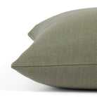 Side view of Tonic Living Hampton Sage decorative pillow highlighting its earthy green Belgian linen look.