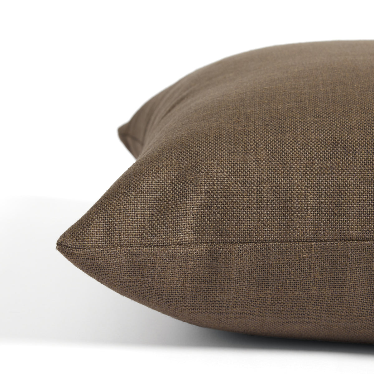 Side view of Tonic Living Hampton Walnut toss cushion highlighting its rich dark brown colour and linen-look texture.