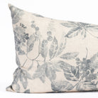 an indigo blue and oatmeal vintage floral print lumbar pillow