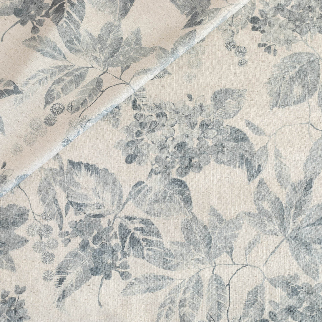 an oatmeal cream and blue hydrangea floral pattern print fabric