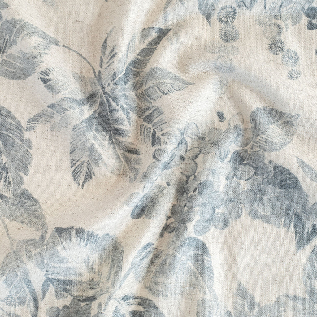 a cream and blue hydrangea floral pattern print fabric
