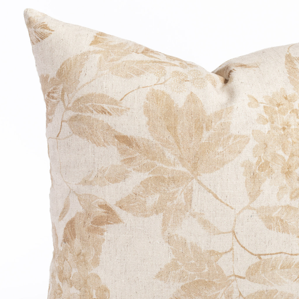 an ochre brown and oatmeal vintage floral print pillow : close up view
