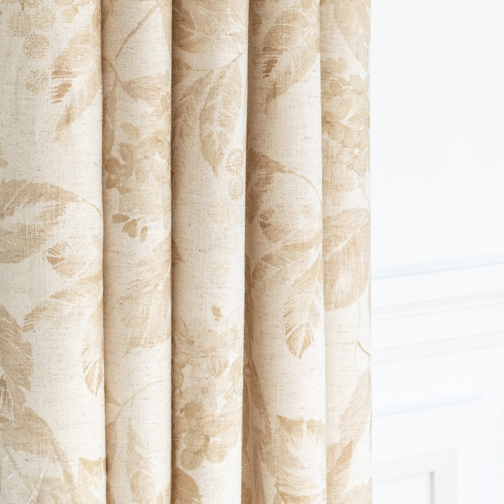 a tonal oatmeal cream and soft ochre brown floral print curtain fabric