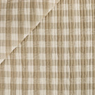 Tonic Living Henry Check Wheat quilted fabric featuring an off-white and beige gingham check.
