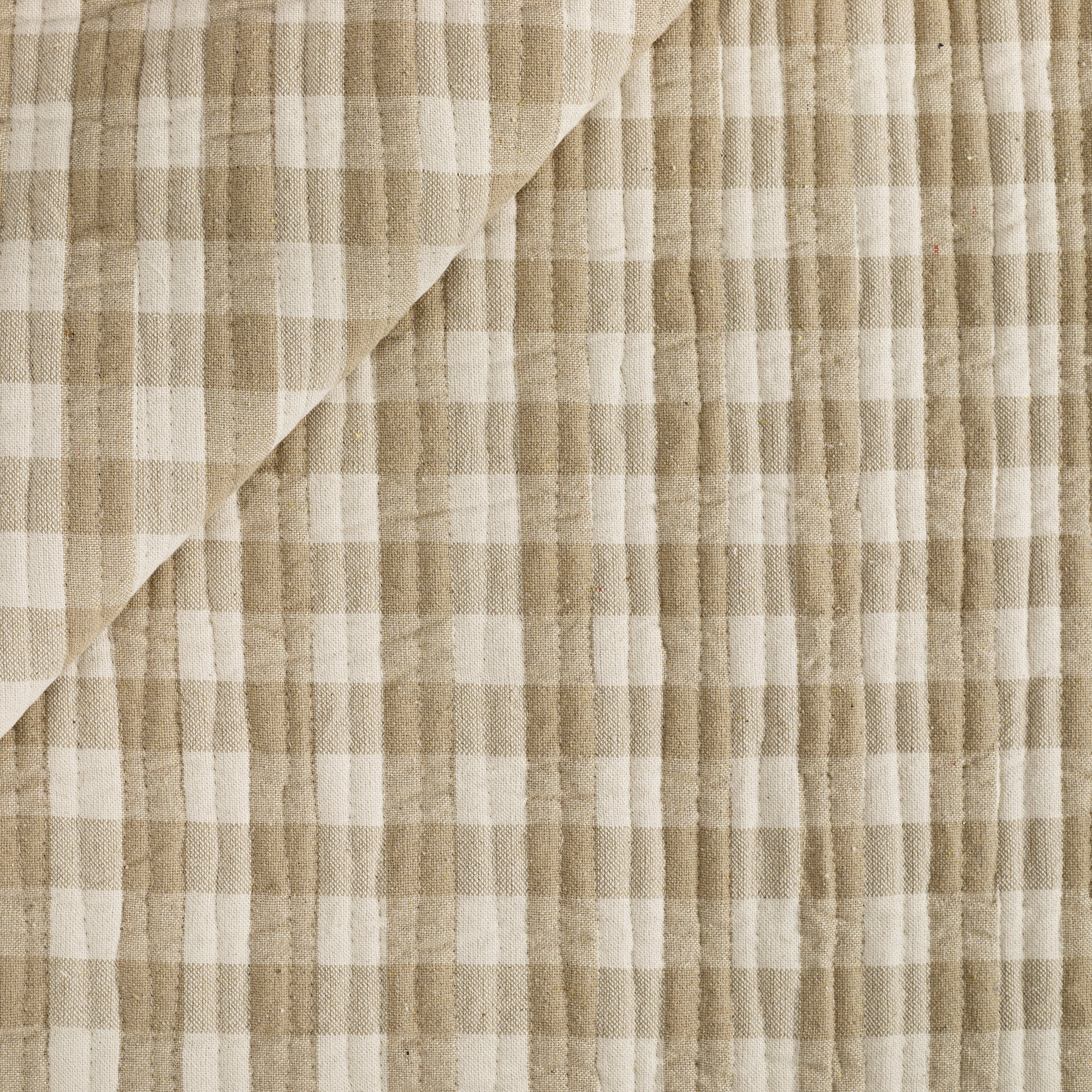 Tonic Living Henry Check Wheat quilted fabric featuring an off-white and beige gingham check.