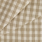 Tonic Living Henry Check Wheat matelassé fabric with a timeless off-white and beige check pattern.