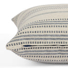 Side zipper detail of Tonic Living Hopper Stripe 22x22 toss cushion in a blue and tan stripe.