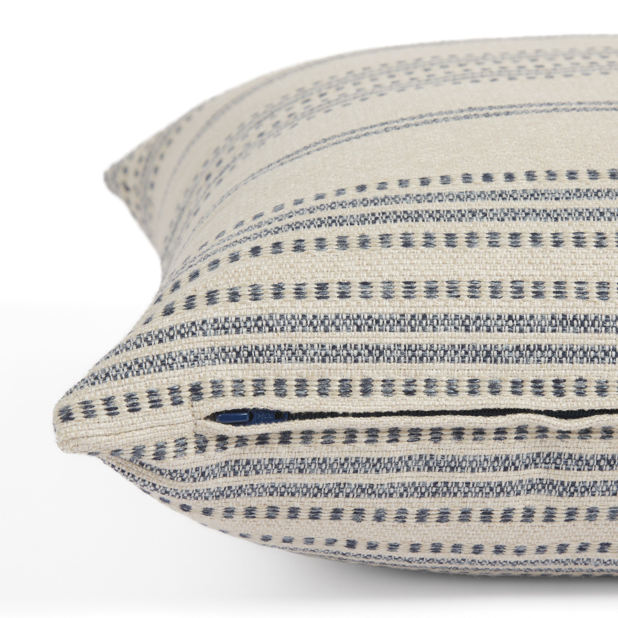 Side zipper detail of Tonic Living Hopper Stripe 22x22 toss cushion in a blue and tan stripe.