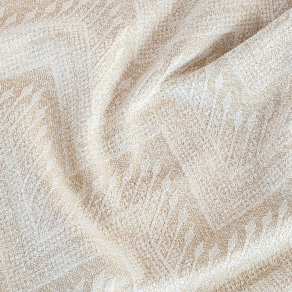 a beige upholstery fabric with a delicate woven white geometric pattern : close up view 3