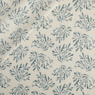 Tonic Living Juniper Fabric in Harbour Blue, a blue and cream botanical print drapery fabric with sprig pattern.