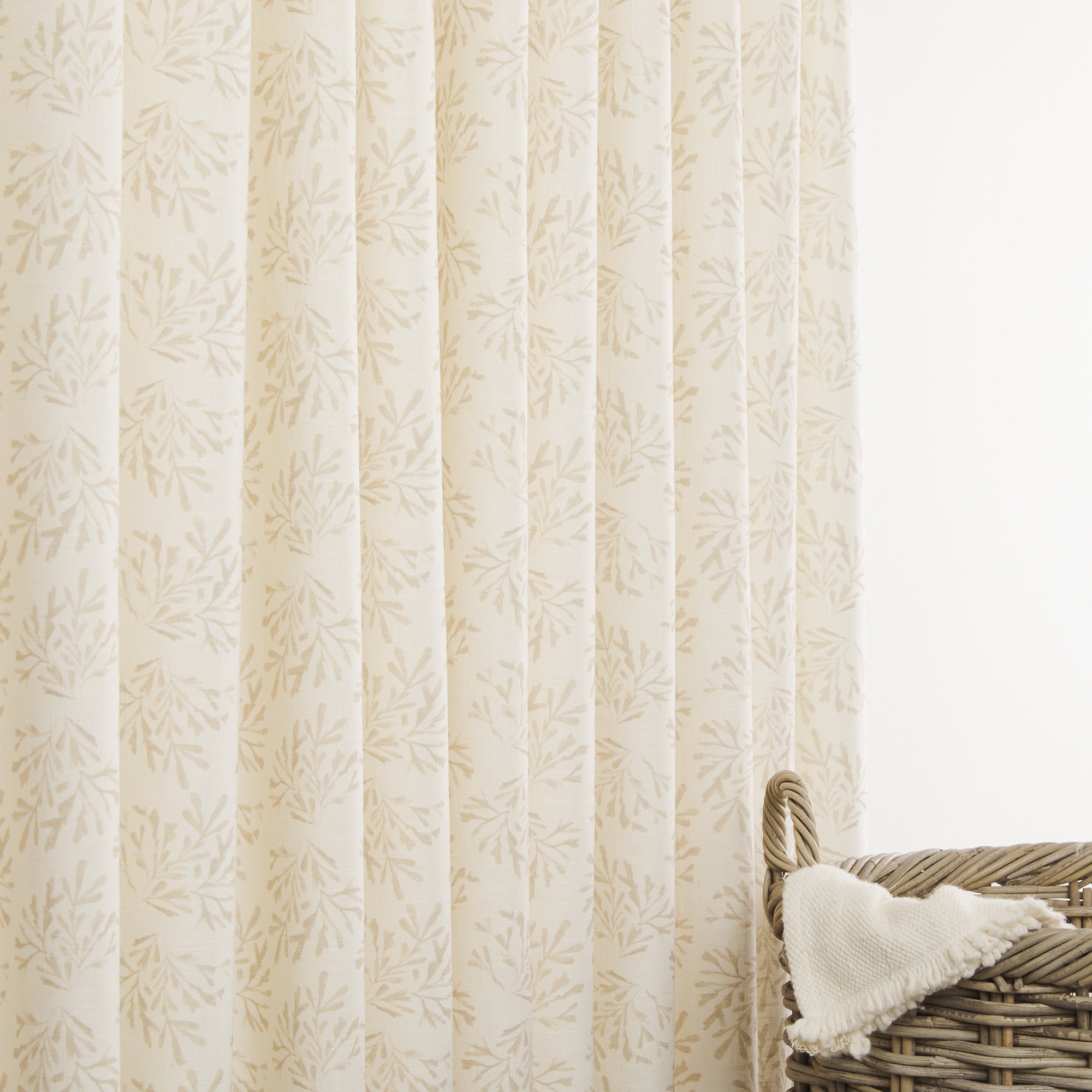 Tonic Living Juniper Parchment linen-blend drapery fabric in a soft cream and sand botanical sprig print.