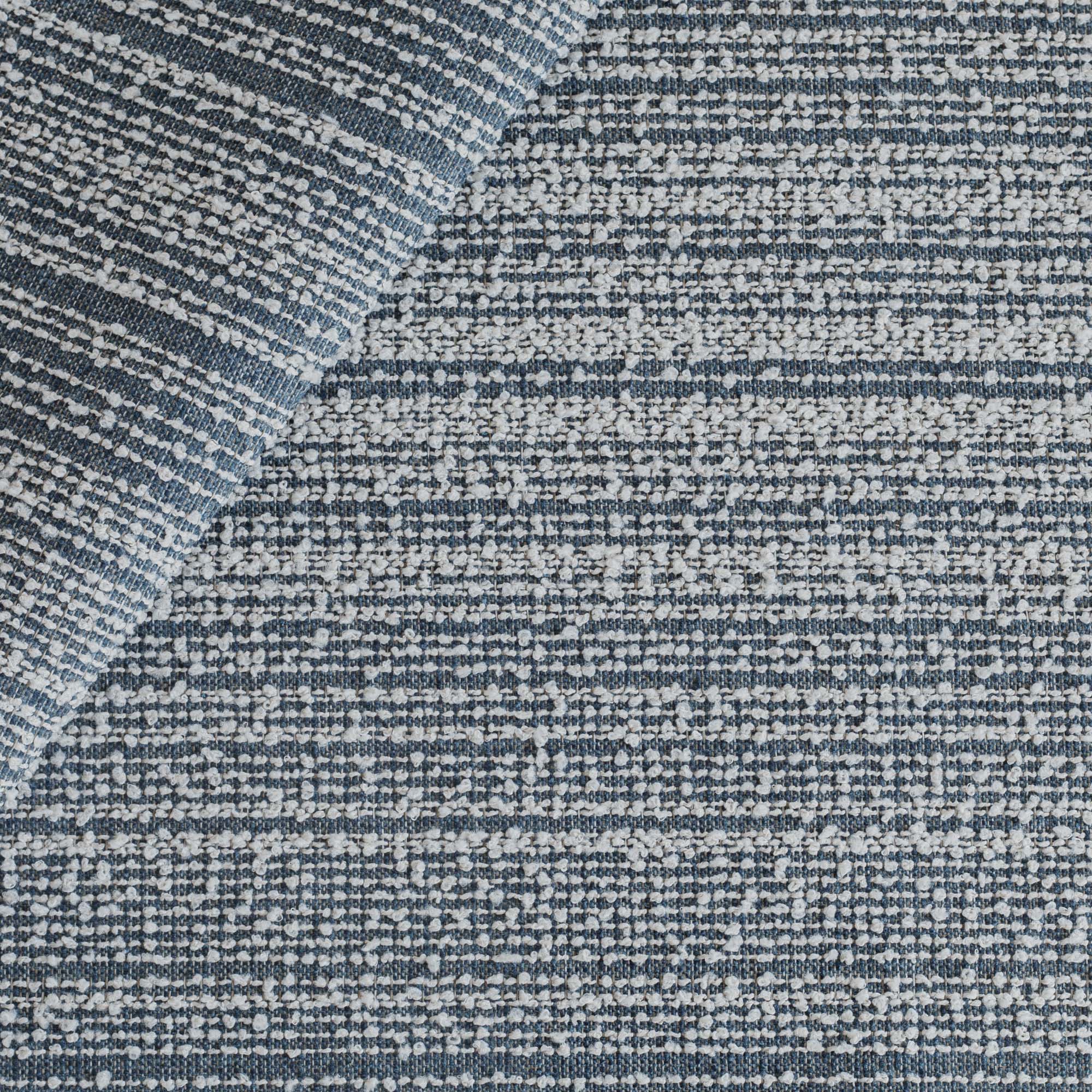 Kos Stripe Chambray, a denim blue with white boucle striped upholstery fabric from Tonic Living 