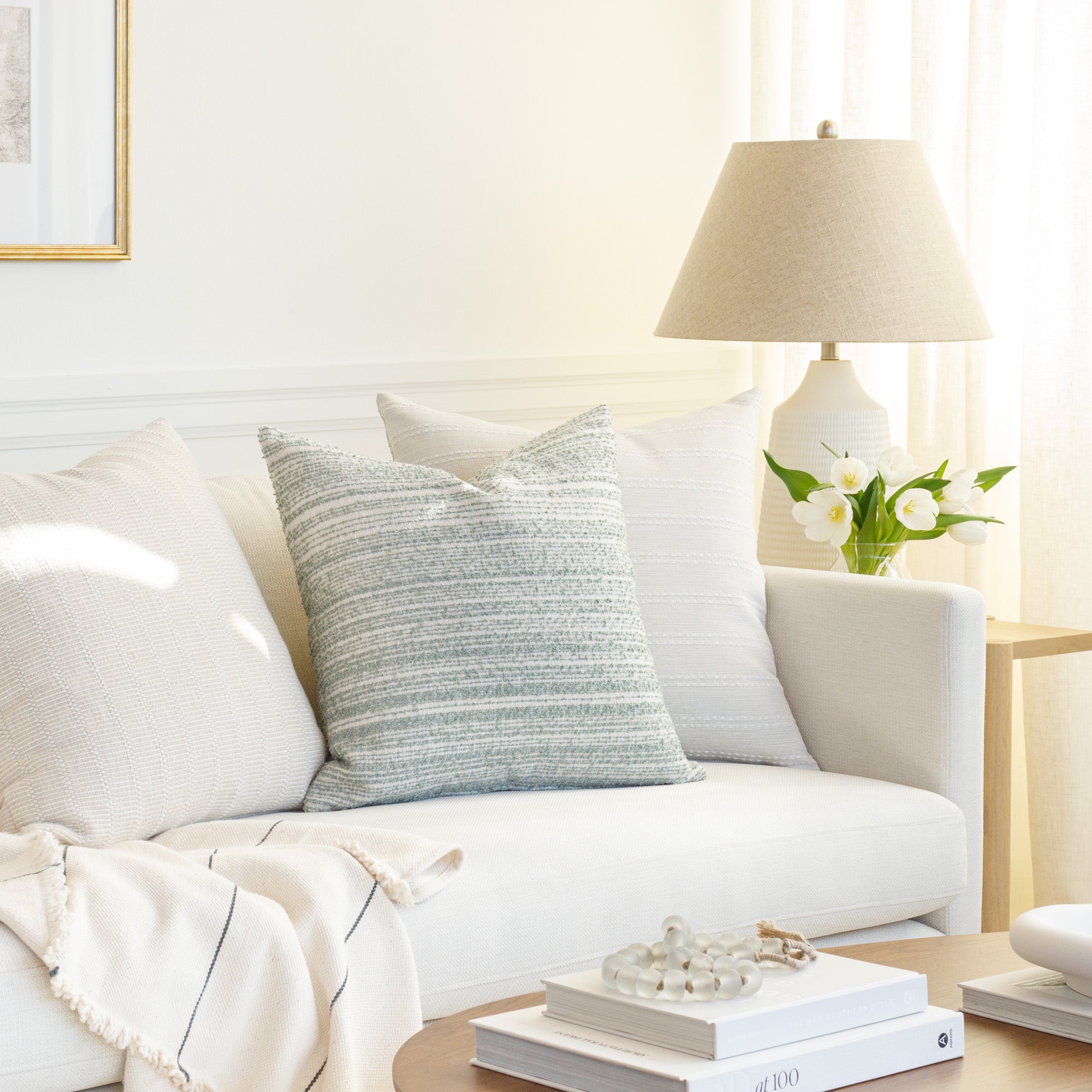 Aqua and soft white throw pillows from Tonic Living