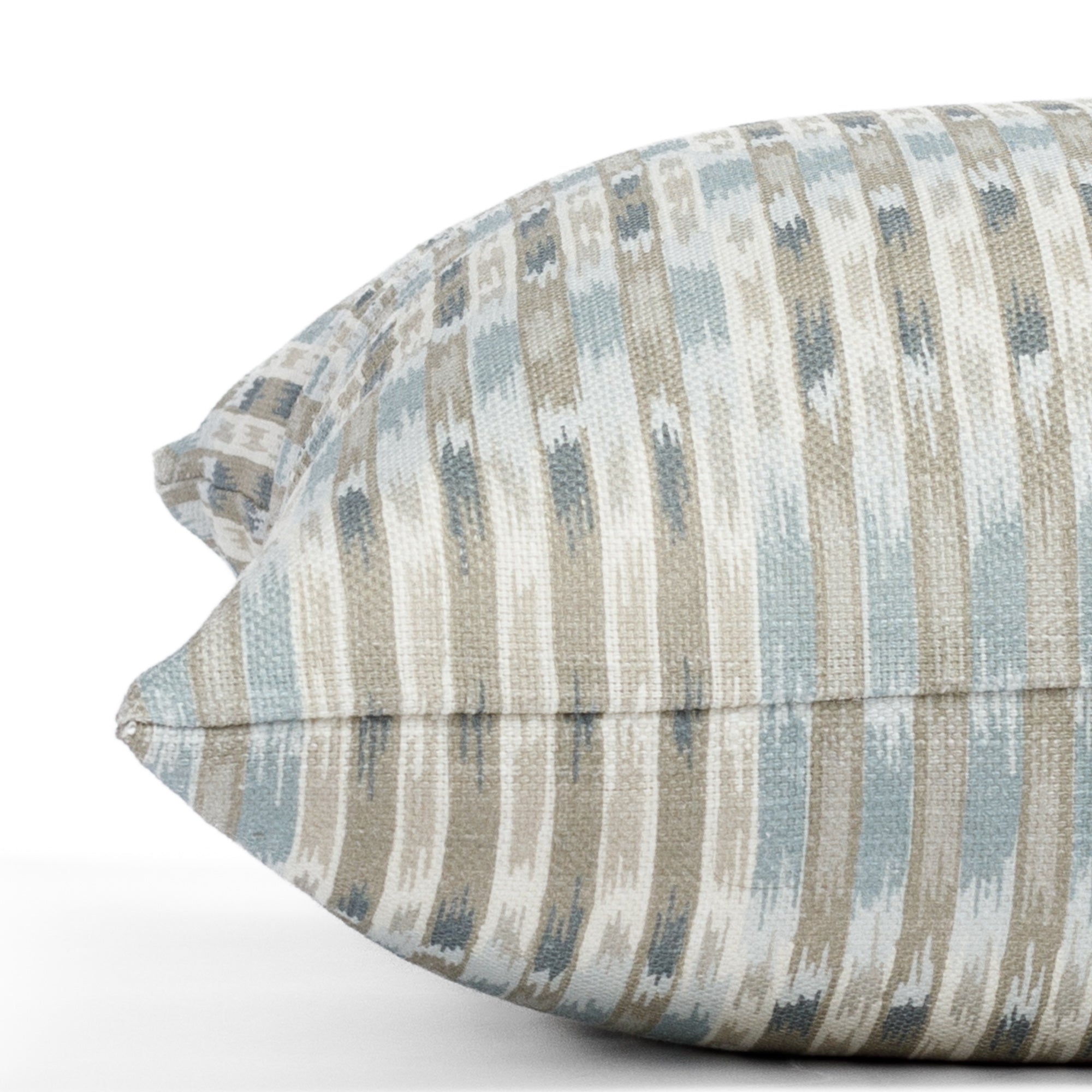 a watery blue, sand and white ikat print throw pillow : side detail