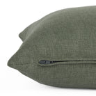 Side zipper detail of Loden 22x22 Pillow, Sage by Tonic Living — decorative cushion in muted green with a soft, linen-style weave.