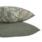 Stack of pillows featuring Loden 22x22 Pillow, Sage and Manor Tapestry 20x20 Pillow, Sage by Tonic Living — soft green tones with rich texture.