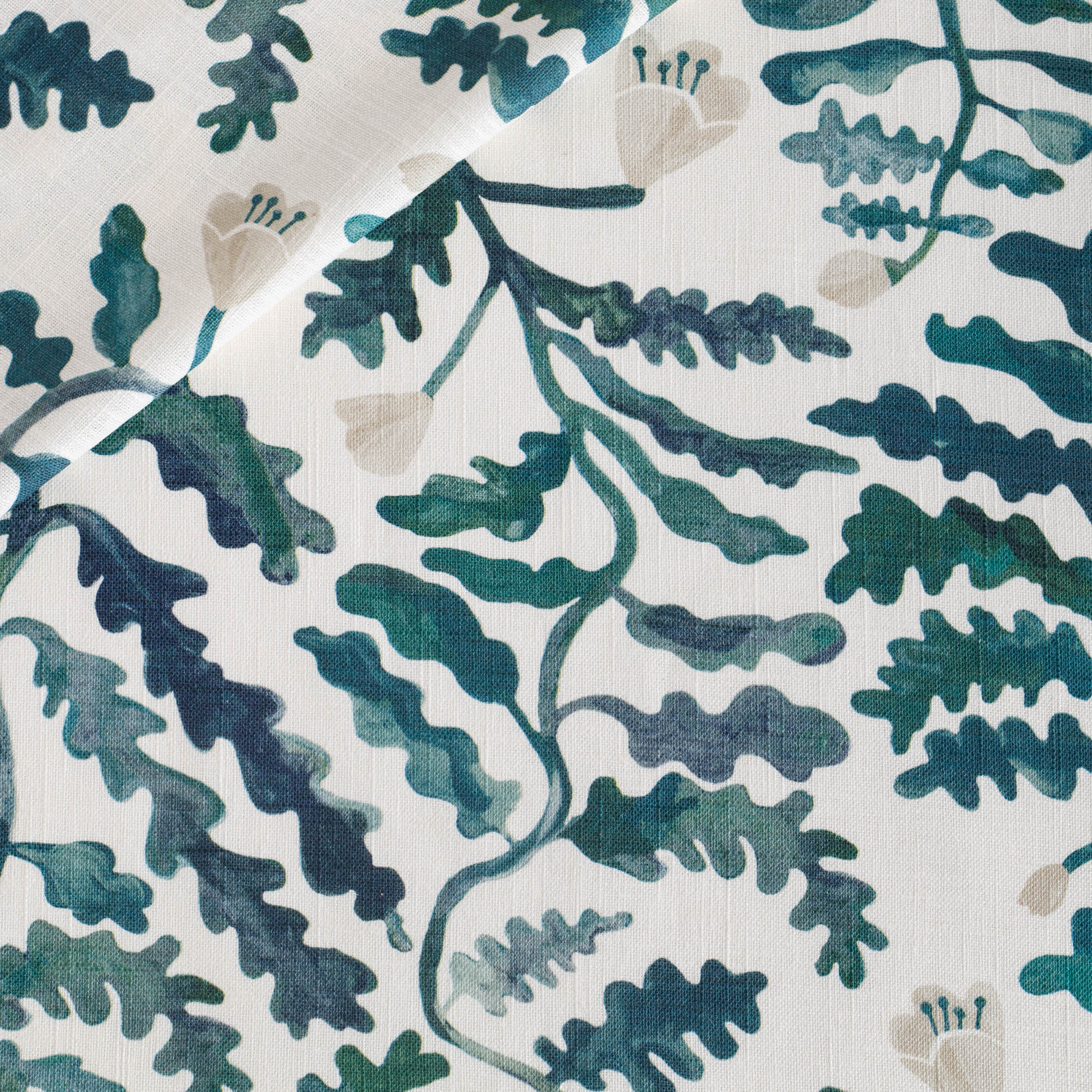 Lola Fabric, a teal and forest green and white leafy botanical linen blend fabric from Tonic Living