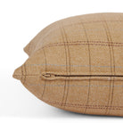 Side zipper detail of Tonic Living Lundie Plaid 20x20 pillow in a camel plaid with wool-blend texture.