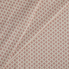 Tonic Living Lyra Fabric, Berry — linen-blend drapery fabric with a white and faded burgundy floral block print design.