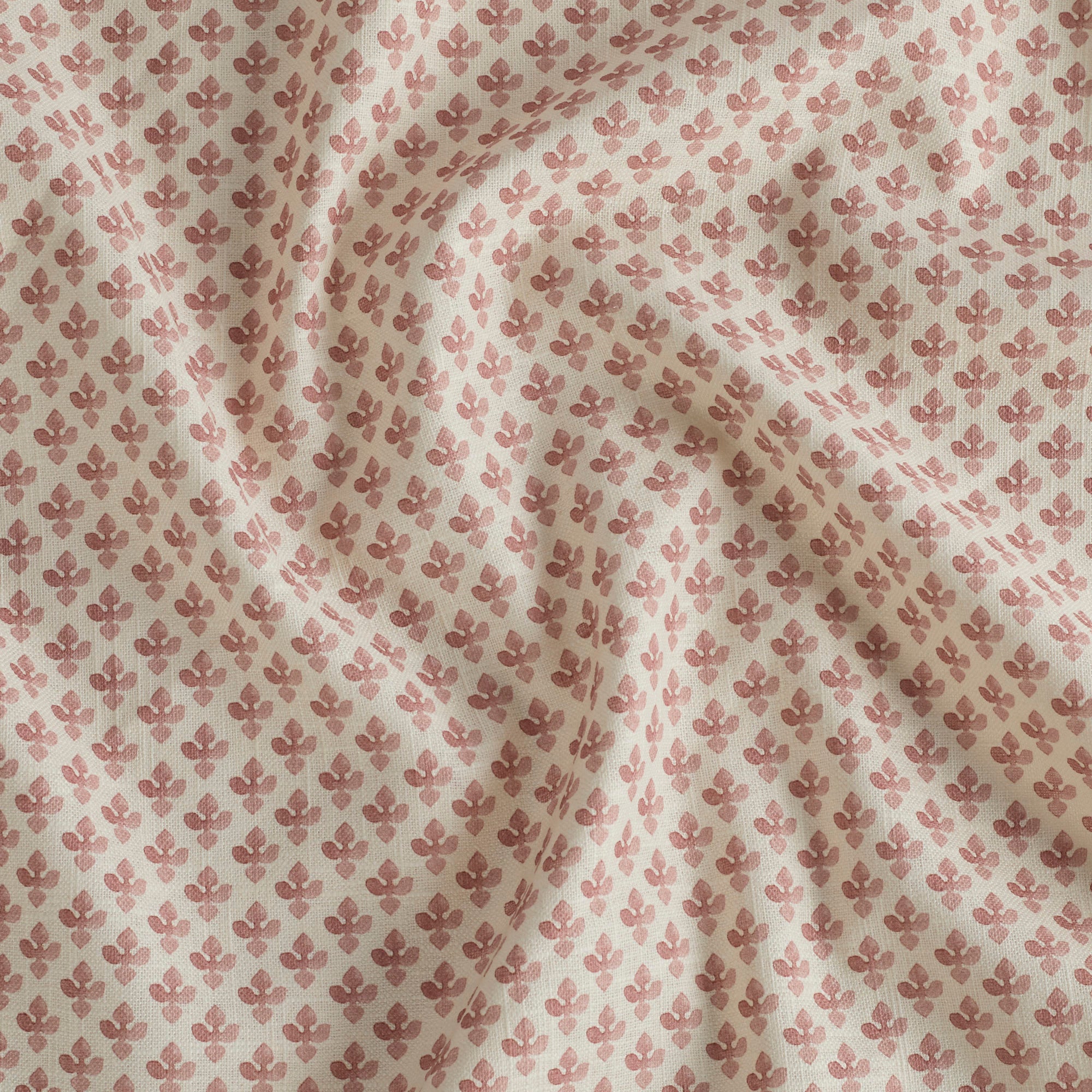 Lyra Berry high-quality drapery fabric by Tonic Living — white and faded burgundy floral block print on soft linen-blend material.