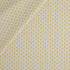 Lyra Fabric, Butter Yellow by Tonic Living — white and yellow floral block print on a lightweight linen-blend fabric.