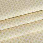 Lyra Butter Yellow roman shade fabric by Tonic Living — lightweight linen-blend fabric with a white and yellow floral block print.
